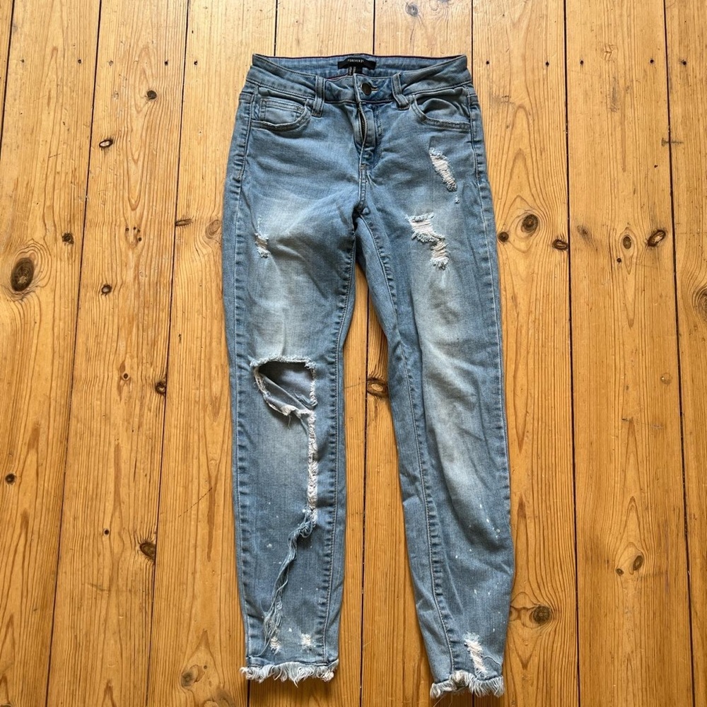 Distressed denim jeans